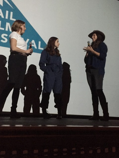 From left, Molly McGlynn, writer and director of the film "Mary Goes Around," and lead actor Aya Cash speak about their film with program director Jacqueline Jorgeson, after its Colorado premiere on April 6.